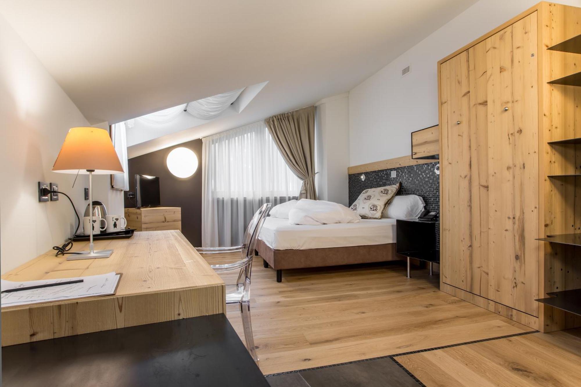 Hotel Orso Grigio Cavalese Bagian luar foto