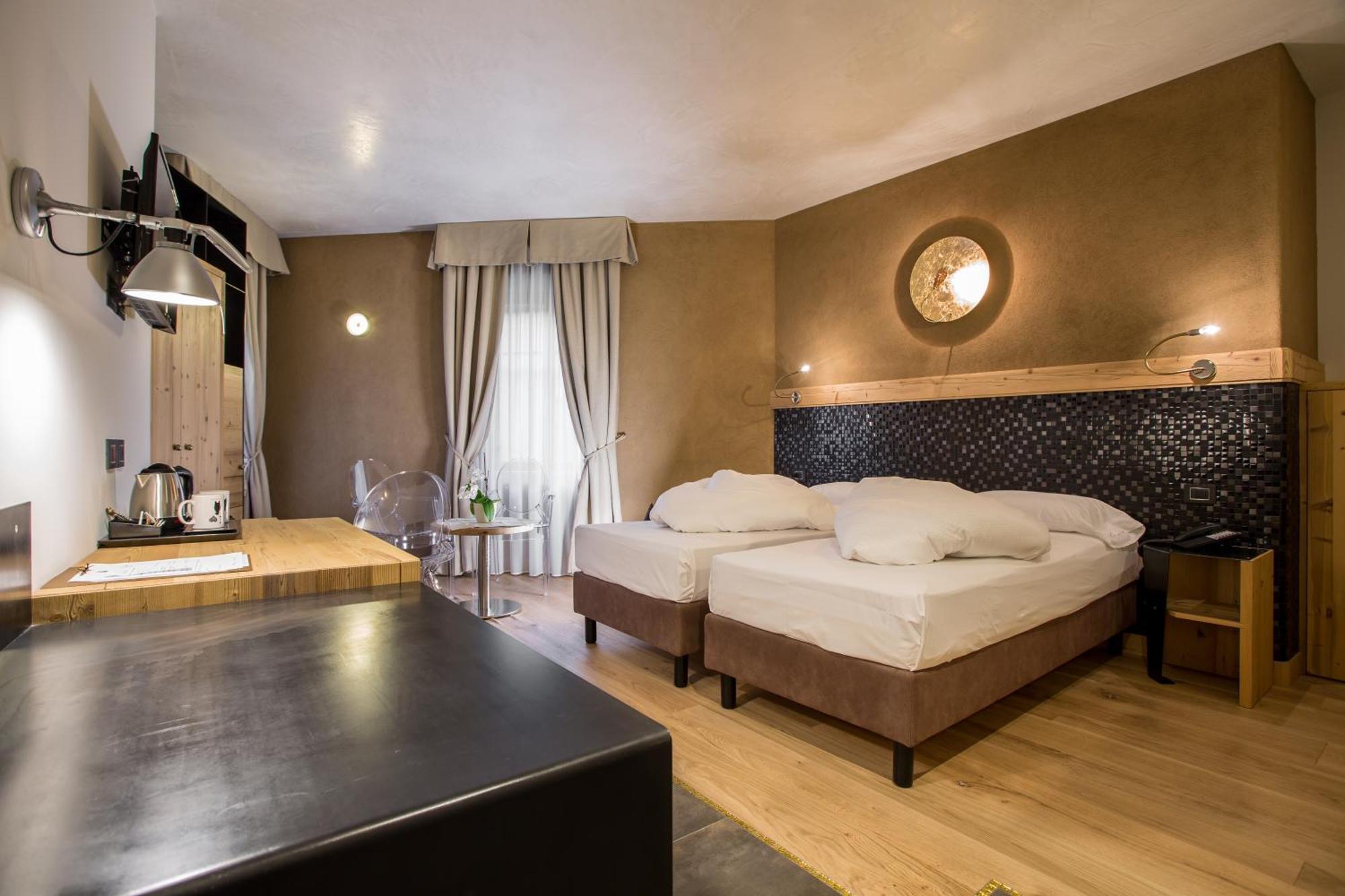 Hotel Orso Grigio Cavalese Bagian luar foto