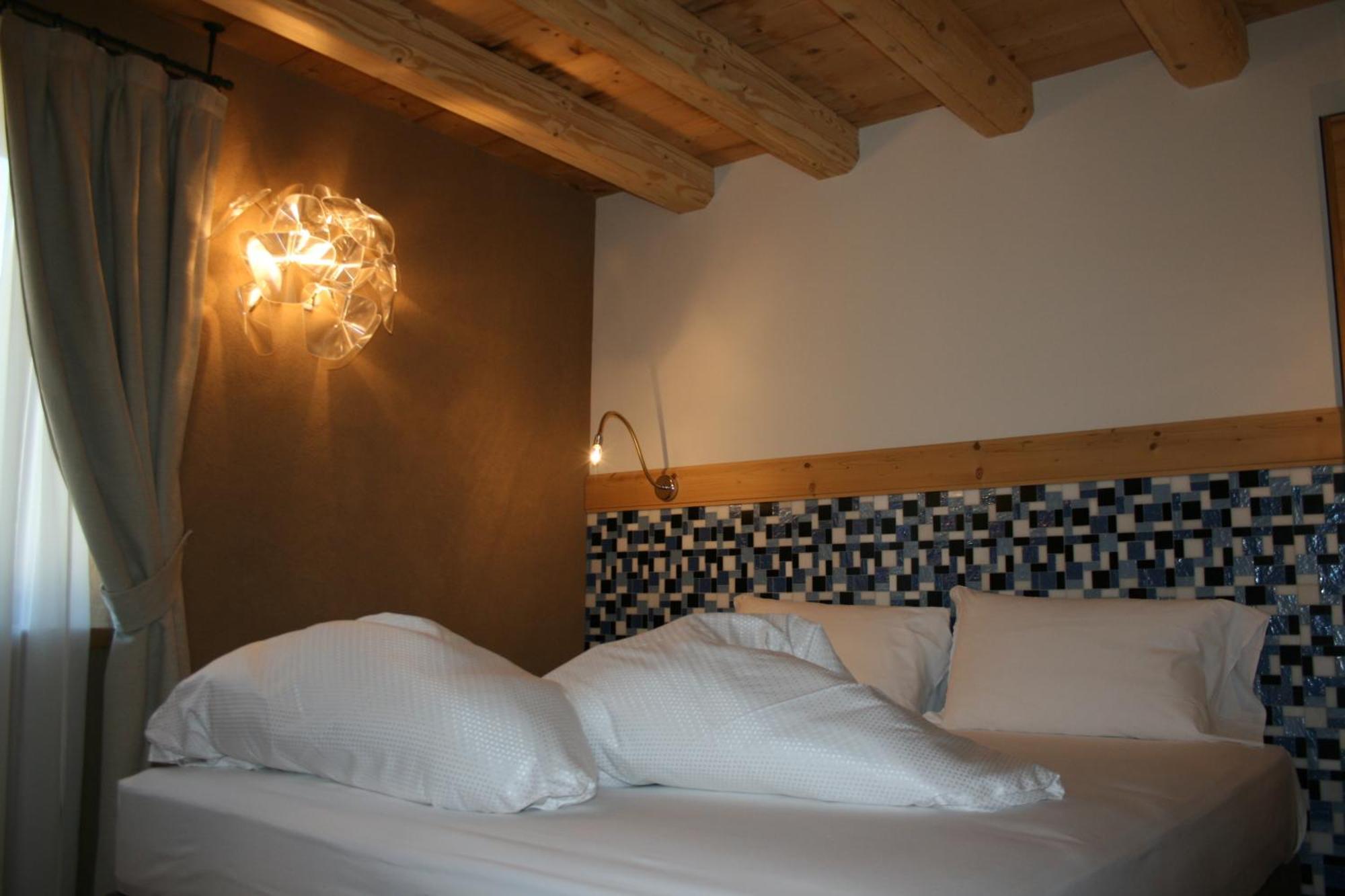 Hotel Orso Grigio Cavalese Bagian luar foto