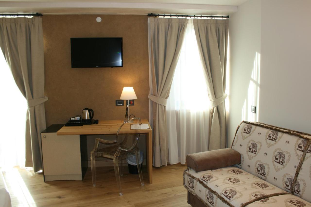 Hotel Orso Grigio Cavalese Bagian luar foto